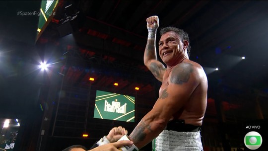 Popó entra em cirurgia após briga generalizada em luta contra Wanderlei Silva; exames mostram fratura na mão - Ex-campeão mundial está em cirurgia na Bahia após confusão no ringue; exames indicam fratura na mão direita, mas assessoria não detalhou a lesão.