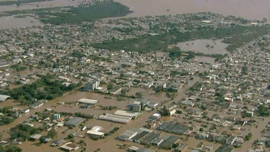 Imagens aéreas mostram Canoas inundada durante enchente; mais de 180 mil pessoas foram atingidas - Foto: (Globo/Reprodução)
