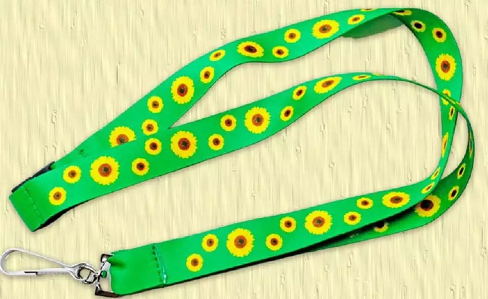 O uso de colar de girassol serve para identificar pessoas com deficiência não visível.  — Foto: Reprodução/CLDF