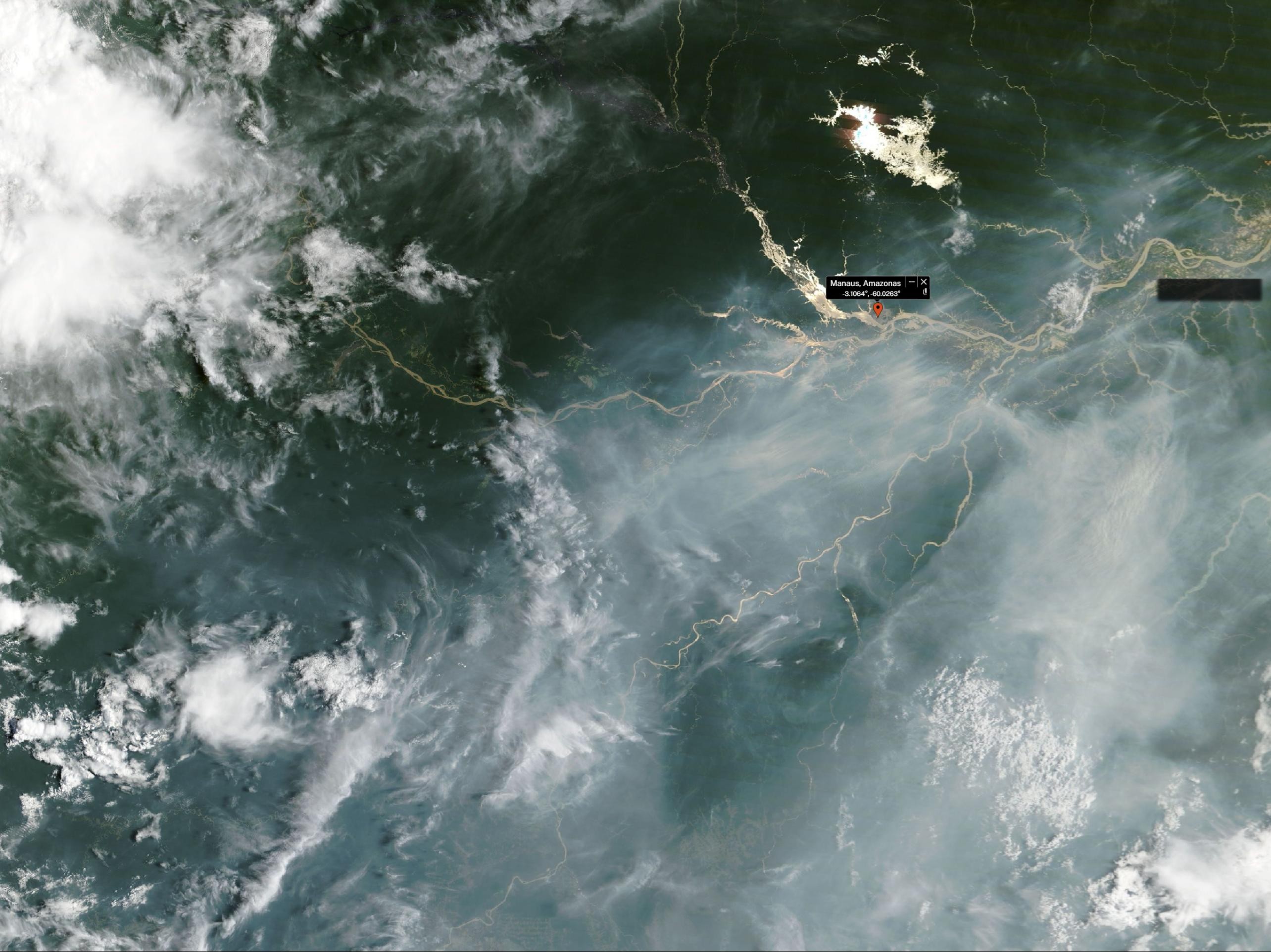 Satélite da Nasa registra fumaça de queimadas florestais no AM vista do espaço