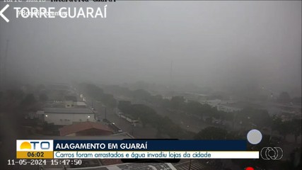 Veículos e lojas ficam debaixo d'água após forte temporal em Guaraí
