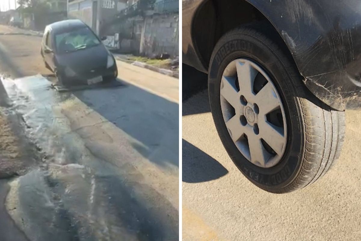 Vídeo mostra carro inclinado após roda cair em buraco e ficar presa em rua de Pindamonhangaba