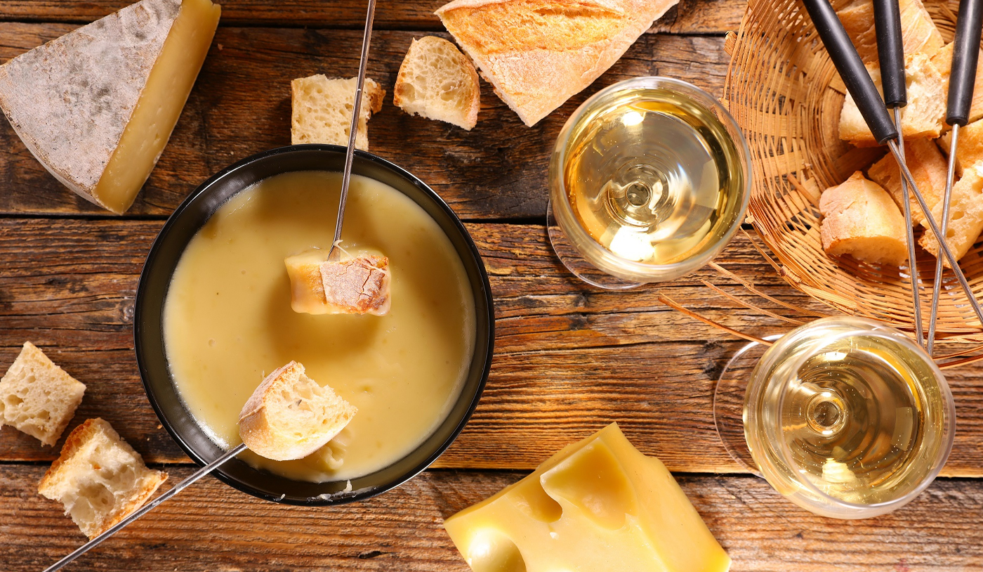 Os melhores vinhos para harmonizar com fondue de queijos