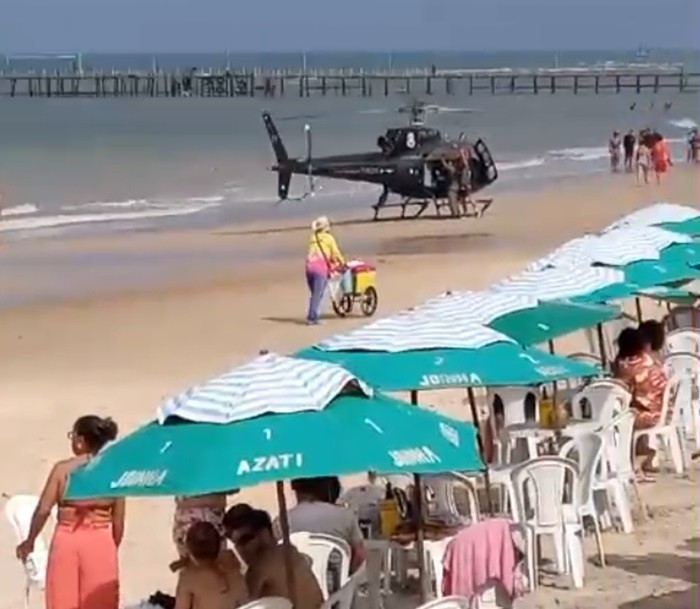 VÍDEO: Helicóptero pousa perto de banhistas durante resgate a homem que se afogou em praia da Grande Natal