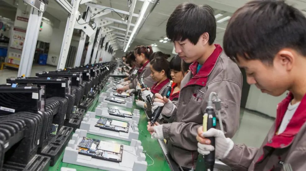 A Apple mudou sua produção para a China no início dos anos 2000 — Foto: BBC/Getty Images