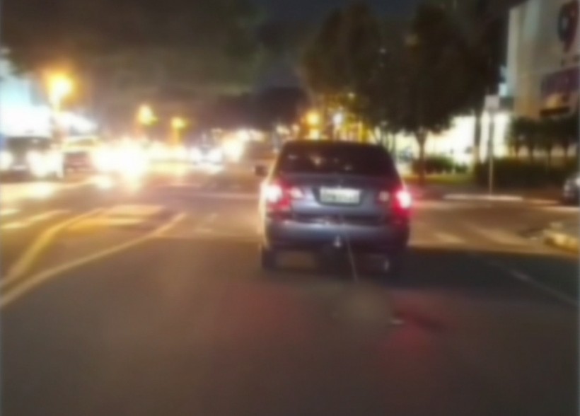 Cachorro amarrado por corda é arrastado por carro em avenida de Maringá: VÍDEO