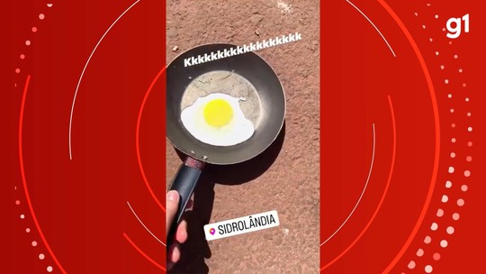 'Será que tá quente?': moradora frita ovo no asfalto durante calorão - Foto: (Reprodução)