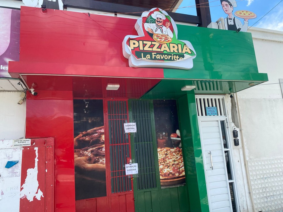 Pizzaria � interditada ap�s suspeita de surto por intoxica��o alimentar, em Pombal, na PB � Foto: Geraldo Jer�nimo / TV Para�ba