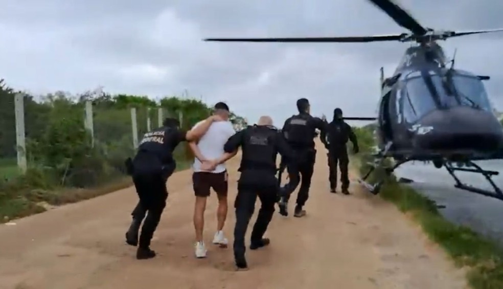 Adilsinho é levado de helicóptero para a sede da PF — Foto: Reprodução