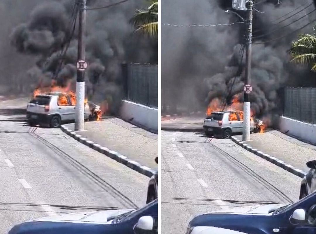 Carro pega fogo próximo a ginásio esportivo em Guarujá; VÍDEO