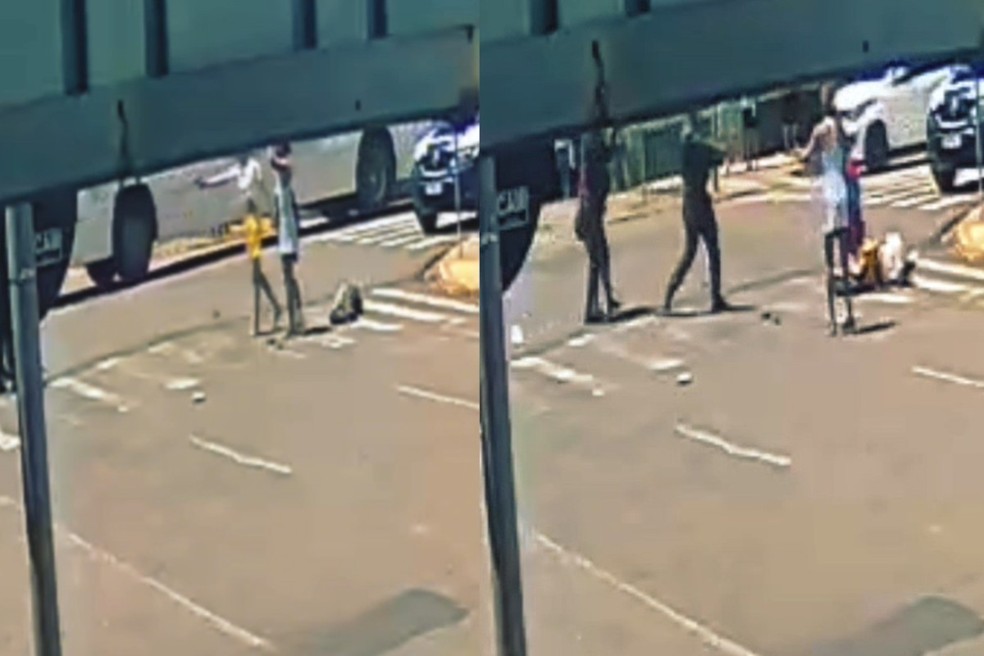 Mulher trans apontou arma a policial durante briga. — Foto: Câmeras de segurança/Reprodução