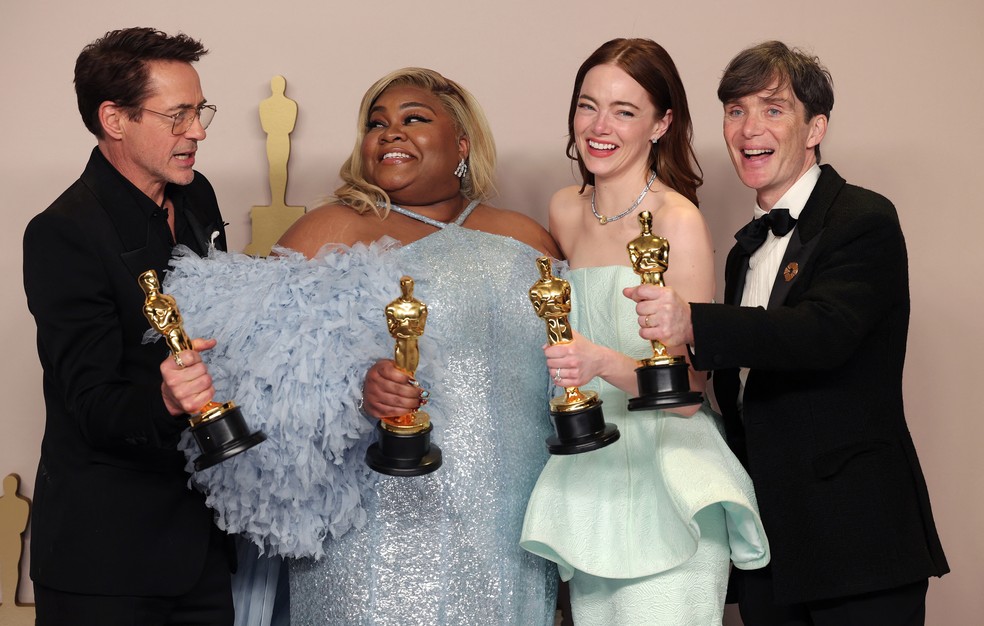Robert Downey Jr. (melhor ator coadjuvante), Da'Vine Joy Randolph (melhor atriz coadjuvante), Emma Stone (melhor atriz) e Cillian Murphy (melhor ator) — Foto: REUTERS/Carlos Barria