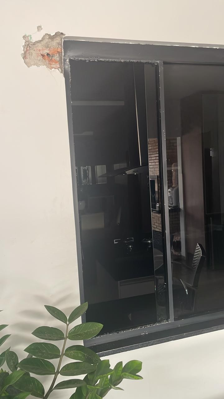 Parede com buraco dos tiros
